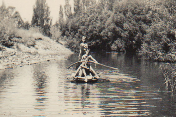 Children on a raft in the River Torrens.