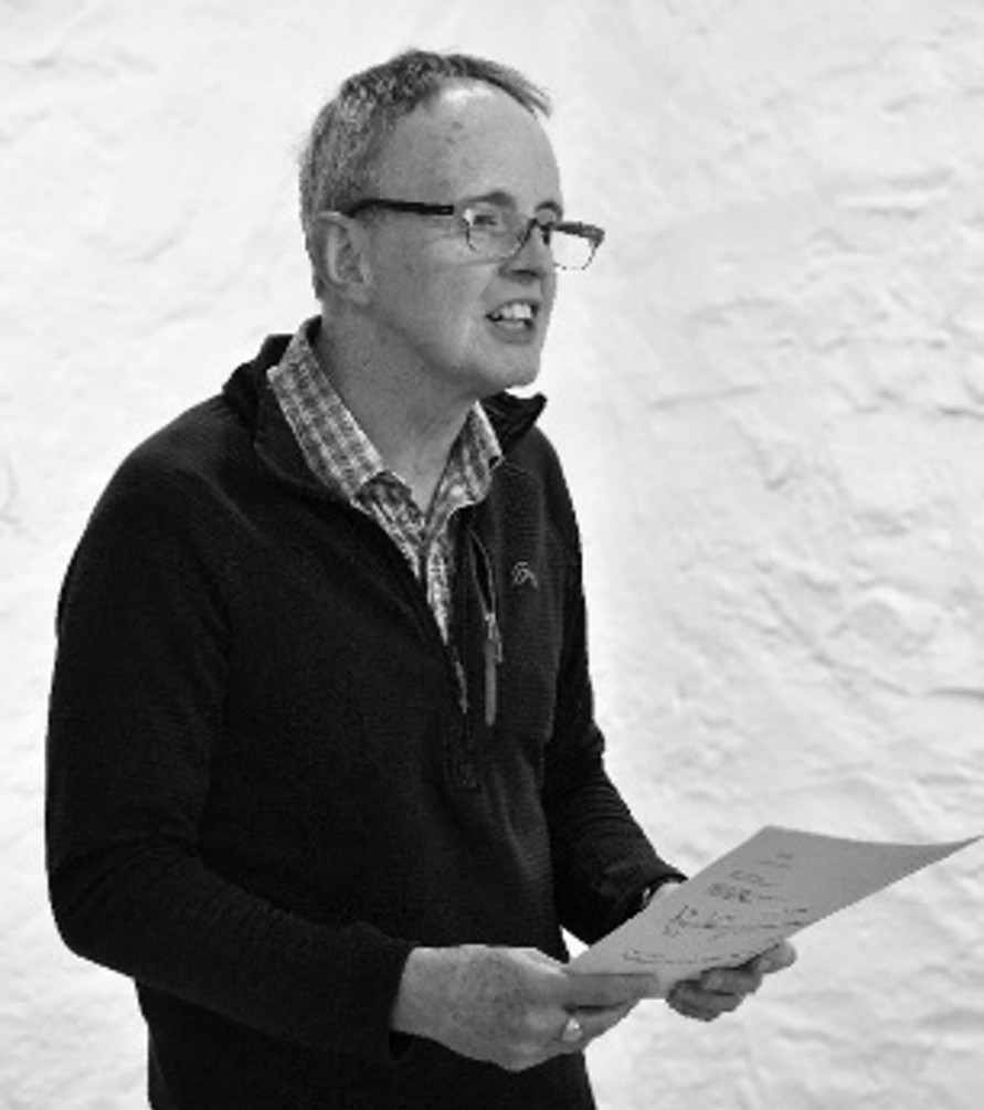 Bruce Greenhalgh speaking at a Poetry Laboratory event.