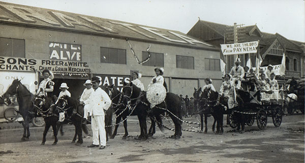 A parade of people and horses.