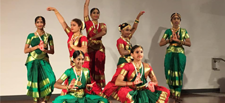 Dancers dressed in colourful costumes