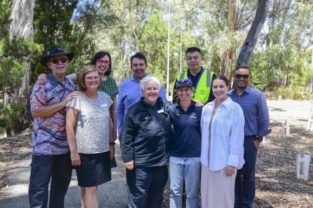 A group of people smiling at the Fourth Creek Morialta Parri Trail Project Launch 
