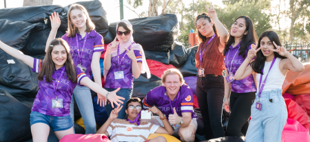 A group of youth having fun and smiling.