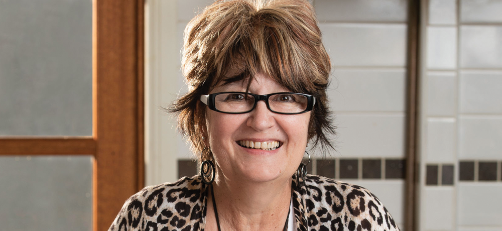 A portrait of Sandi Itropico