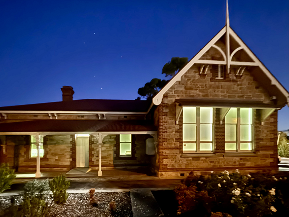 The Marchant Community Centre building at dusk.