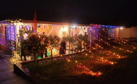 A home decorated with Diwali lights