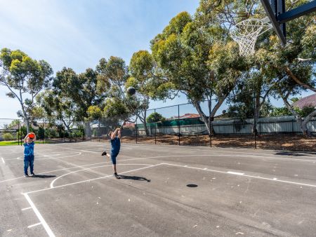 Children playing basketball at Playford Road Reserve